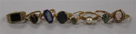 Eight assorted 9ct gold and gem set rings, including, hematite, cats eye, cameo, black onyx and cultured pearl.